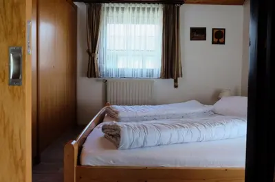 Ein Bett oder Betten in einem Zimmer der Unterkunft Robinson Crusoe