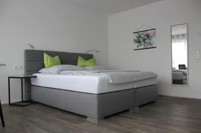 Ein Bett oder Betten in einem Zimmer der Unterkunft Rainer Appartements