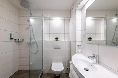 Ein Badezimmer in der Unterkunft Hotel Newton Ludwigshafen