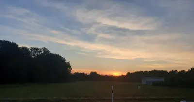 Blick auf den Sonnenuntergang/Sonnenaufgang von der Ferienwohnung aus oder aus der Nähe