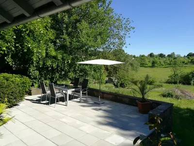 Ein Garten an der Unterkunft Ferienhaus Glücksmoment