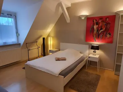 Ein Bett oder Betten in einem Zimmer der Unterkunft coLodging Mannheim - private rooms & kitchen