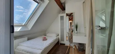 Ein Bett oder Betten in einem Zimmer der Unterkunft coLodging Mannheim - private rooms & kitchen