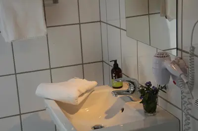 Ein Badezimmer in der Unterkunft Gästehaus & Café Leeze