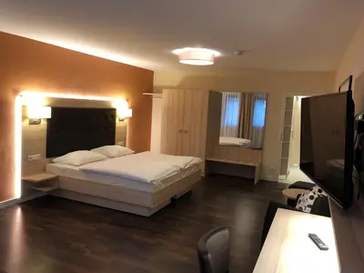 Ein Bett oder Betten in einem Zimmer der Unterkunft 3 Apartments Am Wambolter Hof 3