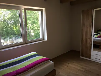 Ein Bett oder Betten in einem Zimmer der Unterkunft Pferd