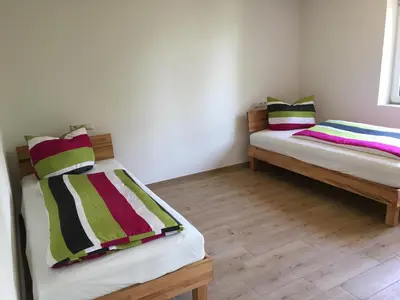 Ein Bett oder Betten in einem Zimmer der Unterkunft Pferd