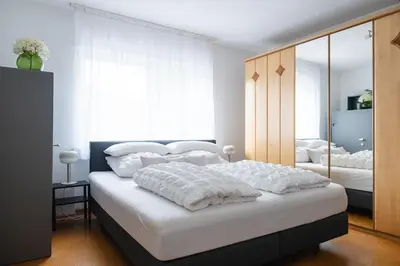 Ein Bett oder Betten in einem Zimmer der Unterkunft Ferienwohnung Casa Rossa