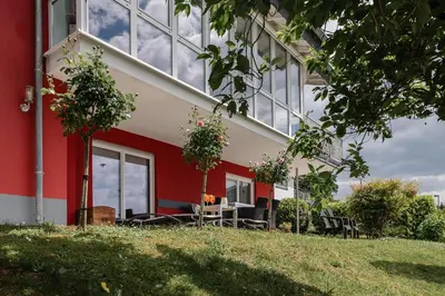 Ein Garten an der Unterkunft Ferienwohnung Casa Rossa