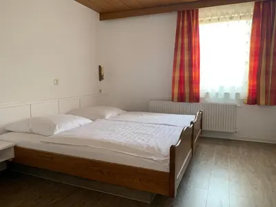 Ein Bett oder Betten in einem Zimmer der Unterkunft Gasthof zum Bären