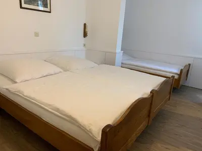 Ein Bett oder Betten in einem Zimmer der Unterkunft Gasthof zum Bären