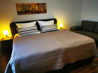 Ein Bett oder Betten in einem Zimmer der Unterkunft Ferienwohnung am Waldpfad