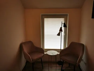 Ein Sitzbereich in der Unterkunft Ferienwohnung am Waldpfad