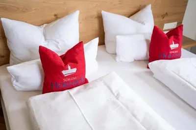 Ein Bett oder Betten in einem Zimmer der Unterkunft Schlosshotel Horneck