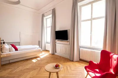 Ein Bett oder Betten in einem Zimmer der Unterkunft Schlosshotel Horneck