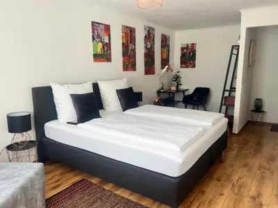 Ein Bett oder Betten in einem Zimmer der Unterkunft Hotel am Hafen