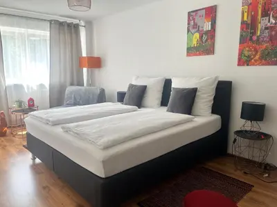 Ein Bett oder Betten in einem Zimmer der Unterkunft Hotel am Hafen