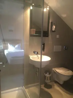 Ein Badezimmer in der Unterkunft Hotel am Hafen