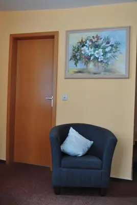 Ein Sitzbereich in der Unterkunft Poseidon Hotel