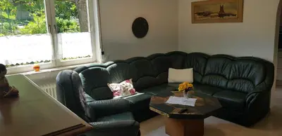 Ein Sitzbereich in der Unterkunft Ferienwohnung Wendel
