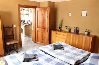 Ein Bett oder Betten in einem Zimmer der Unterkunft Feriengut zum Trinkstorch