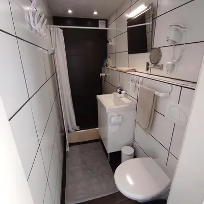 Ein Badezimmer in der Unterkunft Klimatisiertes Ferienhaus am Bauleuteweg 25