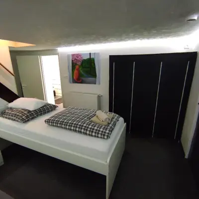 Ein Bett oder Betten in einem Zimmer der Unterkunft Klimatisiertes Ferienhaus am Bauleuteweg 25