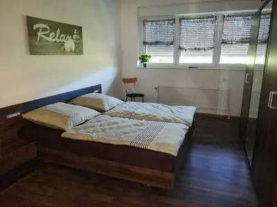 Ein Bett oder Betten in einem Zimmer der Unterkunft Ferienwohnung Gudi