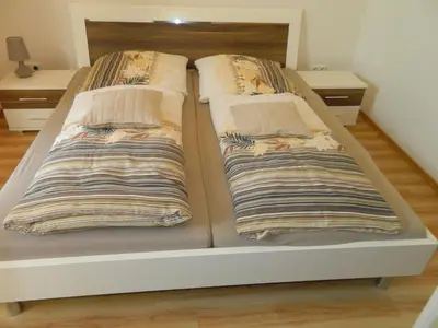 Ein Bett oder Betten in einem Zimmer der Unterkunft Gästehaus Borniger