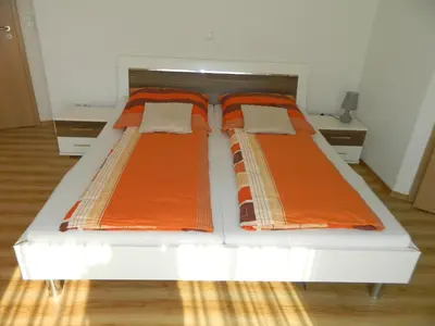 Ein Bett oder Betten in einem Zimmer der Unterkunft Gästehaus Borniger