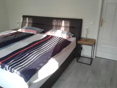 Ein Bett oder Betten in einem Zimmer der Unterkunft Kreuzdellenhof Ferienzimmer