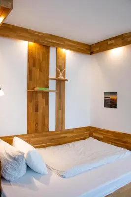Ein Bett oder Betten in einem Zimmer der Unterkunft LuPartment