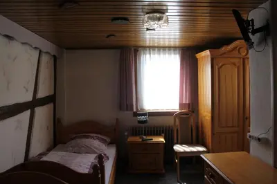 Ein Bett oder Betten in einem Zimmer der Unterkunft Eulenburg