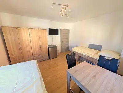 Ein Bett oder Betten in einem Zimmer der Unterkunft AK-Monteurzimmer
