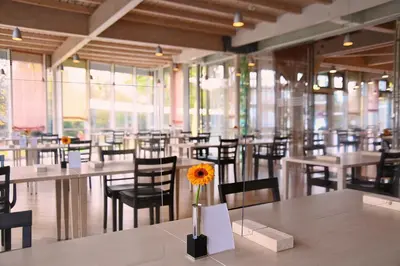 Ein Restaurant oder anderes Speiselokal in der Unterkunft GenoHotel Karlsruhe