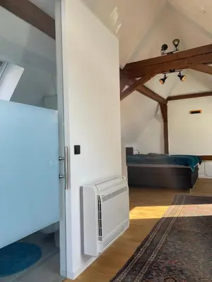 Ein Sitzbereich in der Unterkunft Apartment für zwei Personen in romantischem Weindorf