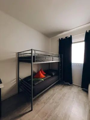 Ein Bett oder Betten in einem Zimmer der Unterkunft Neuwertiges Apartment mit schnellem WLAN, Glasfaser, Kostenlose Privatparkplatz auch für Transporter geeignet R11