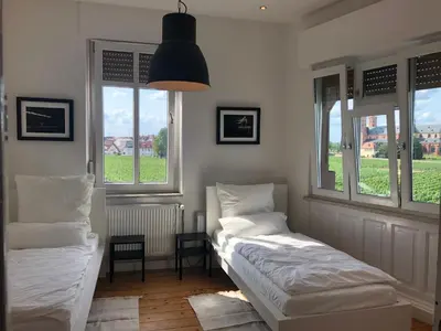 Ein Bett oder Betten in einem Zimmer der Unterkunft Luxe Apartment am Rhein