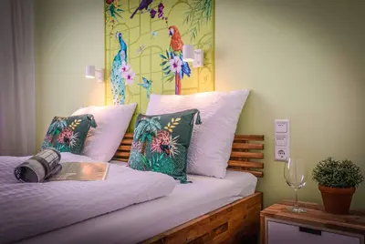 Ein Bett oder Betten in einem Zimmer der Unterkunft Modernes Apartment OLIVE Stilvoll und zentral in Besigheim
