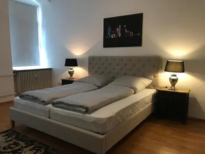 Ein Bett oder Betten in einem Zimmer der Unterkunft Elegantes Gästeapartment Verano in Schloß und Hofgut Langenzell