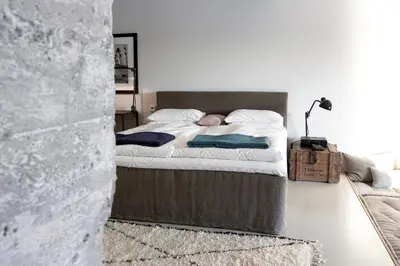 Ein Bett oder Betten in einem Zimmer der Unterkunft Speicher7 Hotel