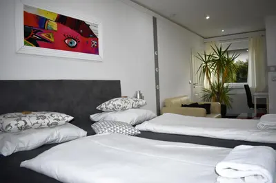 Ein Bett oder Betten in einem Zimmer der Unterkunft Villaci Business Apartments