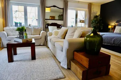 Ein Sitzbereich in der Unterkunft Ferienwohnung Korbmacher - Auszeit in der Pfalz