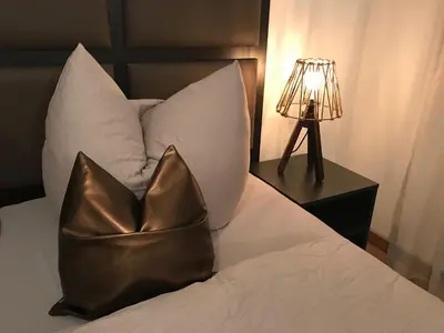 Ein Bett oder Betten in einem Zimmer der Unterkunft HARBOUR Business Apartment Karlsruhe