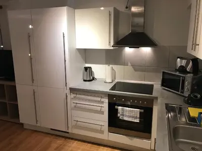Küche/Küchenzeile in der Unterkunft HARBOUR Business Apartment Karlsruhe