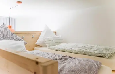 Ein Bett oder Betten in einem Zimmer der Unterkunft Wohnung in TOP-Lage - Direkt am Bahnhof