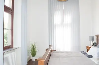 Ein Bett oder Betten in einem Zimmer der Unterkunft Wohnung in TOP-Lage - Direkt am Bahnhof