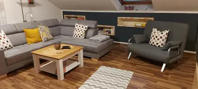 Ein Sitzbereich in der Unterkunft Ferienwohnung Trommblick - Natur Pur - Rimbach im Odenwald