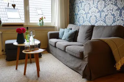 Ein Sitzbereich in der Unterkunft Ferienwohnung Tabakbauer - Auszeit in der Pfalz