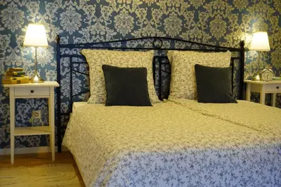 Ein Bett oder Betten in einem Zimmer der Unterkunft Ferienwohnung Tabakbauer - Auszeit in der Pfalz